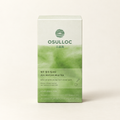 OSULLOC Jeju Matcha Milk Tea — Caja sobre un fondo marfil cálido.