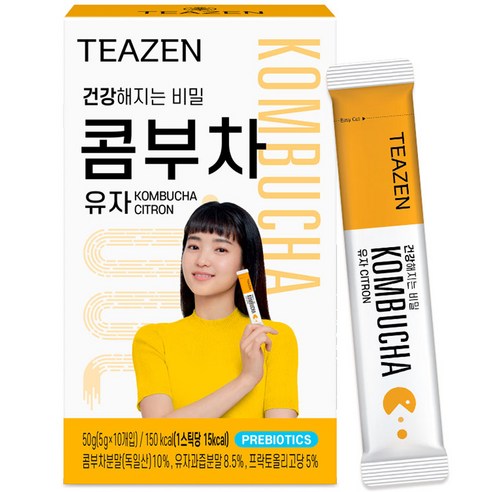 TEAZEN Kombucha Citron — Yellow-and-white kombucha box with a printed portrait, beside an individual stick.