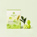 OSULLOC Sunshine Muscat Cold Brew Tea — Green-and-white box beside cut green grapes and leaves.