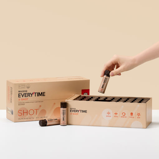 Jung Kwan Jang EveryTime Shot — Hand lifting a bottle from an open EveryTime Shot presentation box.