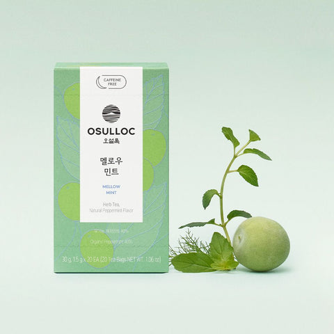 OSULLOC Mellow Mint — Green Mellow Mint box beside fresh herbs and a round green fruit.