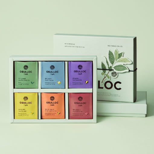 OSULLOC Tea Variation 30 Gift Set — Caja de regalo verde abierta con seis compartimentos de té de colores.