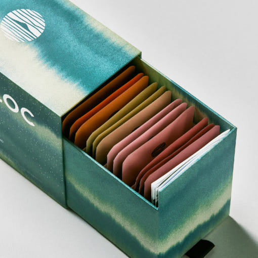 OSULLOC Tea Edition Island Gift Set — Close-up looking down into the turquoise box of colourful tea packets.