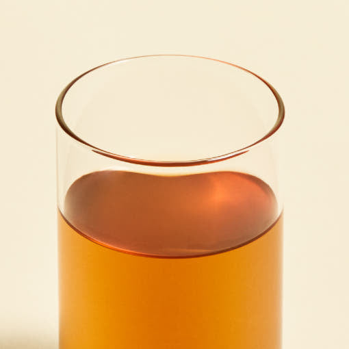 OSULLOC Yuja Earl Grey — Amber tea in a clear glass.