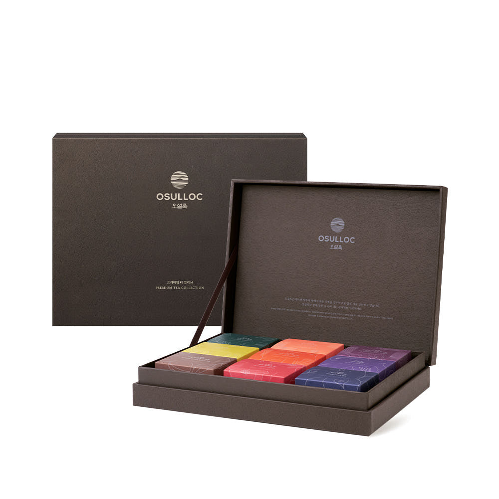 OSULLOC Premium Tea Collection 90 — Open dark gift box with small colourful tea boxes, on white.