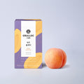 OSULLOC Peach Black Tea — Purple-and-yellow box beside a peach.
