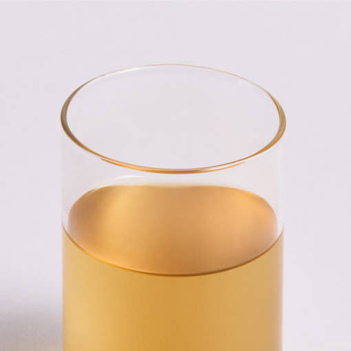 OSULLOC Moon Walk Tea 35 g — Té dorado en un vaso transparente.