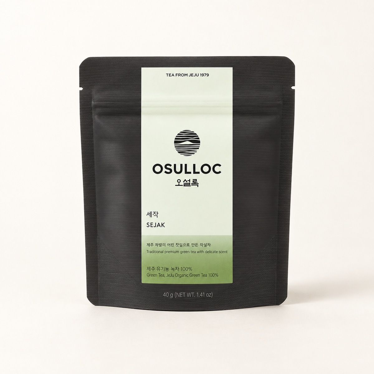 OSULLOC Sejak loose leaf green tea, 40 g in a black resealable pouch on an ivory background.